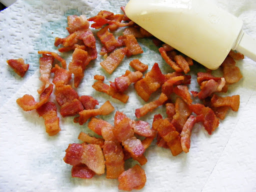 Drain the bacon on paper towels.