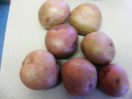Red potatoes. 7 or 8 small red potatoes usually make a pound.