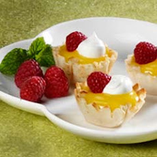 Lemon Curd Tartlets With Fresh Raspberries
