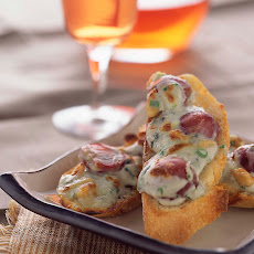 Gorgonzola, Grape and Pine Nut Crostini