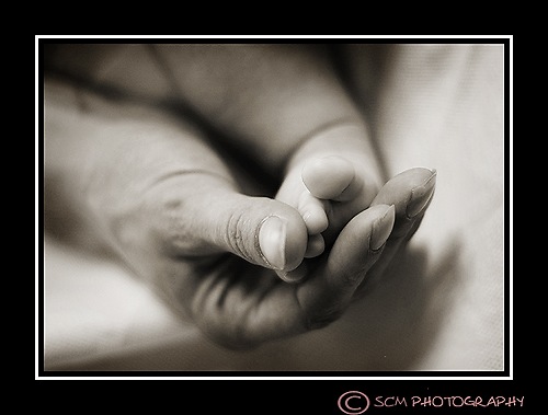 [foot in hand blk[3].jpg]