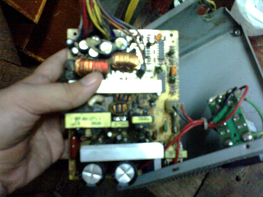 After removing the busted capacitors. After removing the busted capacitors.