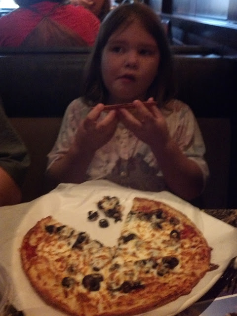 My Celiac kiddo with her gf pizza...she said it is YUMMY!