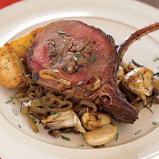 Rack of Venison Stuffed with Pecans, Currants, Sausage, and Pears