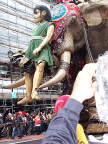 The little girl being carried up Haymarket by the Sultan's Elephant
