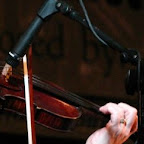 Fiddler Peter Knupfer solos during a set at Coopers Glen Bluegrass Festival, Kalamazoo, Jan. 2008