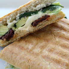 Avocado Panini with Brie, Mozzarella, Sun Dried Tomatoes, and Basil