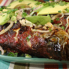 Whole Grilled Achiote Striped Bass with Spicy Pickled Red Onions