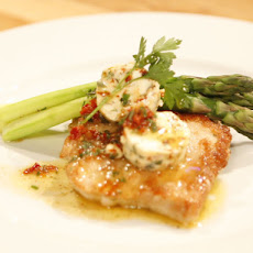 Herbed Pork Paillards with Sundried Tomato Butter and Asparagus