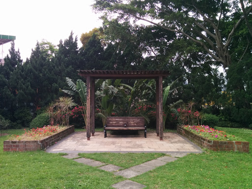 Wooden Pavilion with Colorful Flowers
