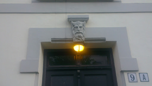 Face Above The Doorway 