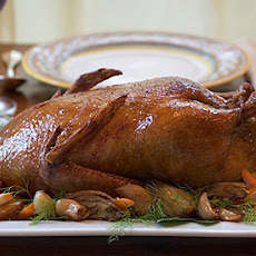 Slow-Roasted Duck with Olive Gravy and Garlic-Fennel Confit