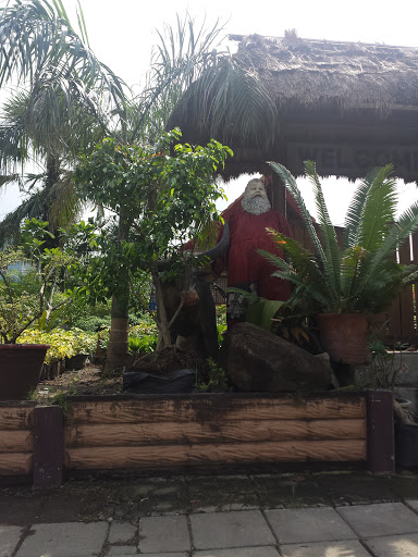 Santa Claus and Carabao Statue