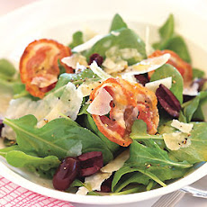 Arugula Salad with Olives, Pancetta, and Parmesan Shavings