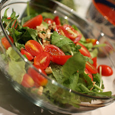 Warm Grape Tomatoes over Greens