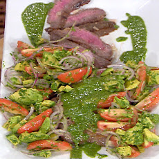 Marinated and Grilled Flank Steak with Chimichurri Sauce, Yucca Fries and Avocado, Tomato and Red Onion Salad