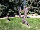 Statue Dogs Playing Fetch