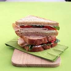 Turkey Sandwich with Ricotta, Red Peppers, and Arugula