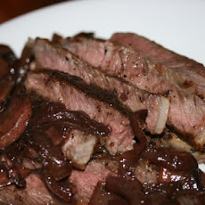 Rib-eye steaks with merlot-mushroom melange