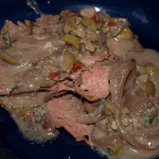 Grilled Steak With Olive and Stilton Cheese Sauce