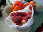 An amazing fruit score from the farmers market in June. The bag of stone fruit was FIVE BUCKS.