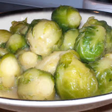 Baby Carrots And Brussels Sprouts Glazed With Brown Sugar and Pepper
