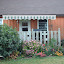 flowerlady's sunny side of the house off the deck garden garden