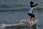 Aya on the board quick and splashing