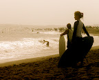 Aya and another skimboarding looking for the next wave