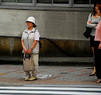 Standing alone.