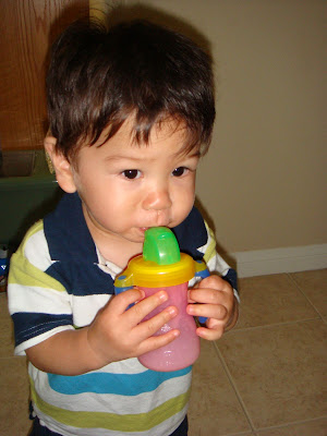 see how advanced he is, using his straw cup all on his own? aww..