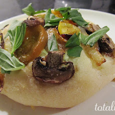 Pizzette with Herbed Goat Cheese & Heirloom Cherry Tomatoes
