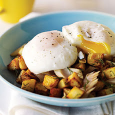 Poached Eggs With Smoked Trout and Potato Hash