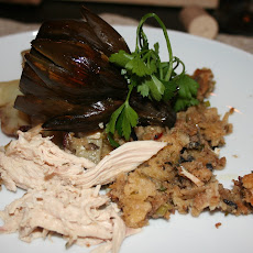Roasted Stuffed Chicken with Herb Butter, Potatoes and Onions