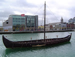 A replica viking ship in the river Liffey.