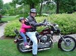 riding with grandpa on the harley, or maybe it's just sitting in the yard cause it doesn't run?...