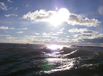 Bright Beautiful sun at the prime season of kayak surfing in south west Michigan. Lake Michigan South Haven, keithwikle.com