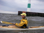 Doug Van Doren clearing the Saugatuck channel mid-sentence. The Kalamazoo river was very warm where it met the cool waters of Lake Michigan. keithwikle.com