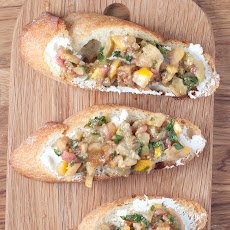 Goat cheese crostini with Meyer lemon, green olive and fig relish