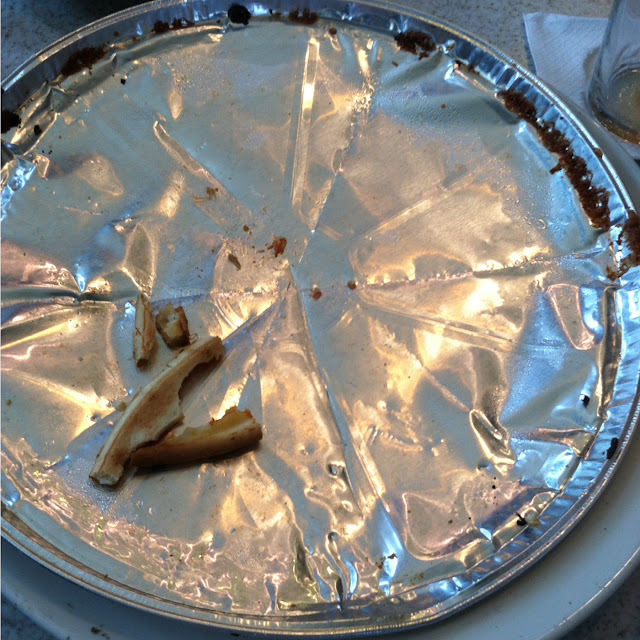 Separate pan used for gf pizza in cooking in the oven