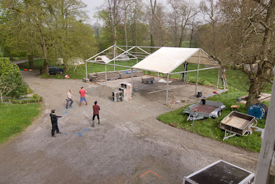The set up crew setting up the dining tent