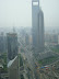 The really tall building (with a hole in it) is the Shanghai World Financial Center. It is the tallest building in China and the third tallest in the world, but...
