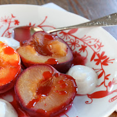 Roasted plums with bay leaf creme anglaise