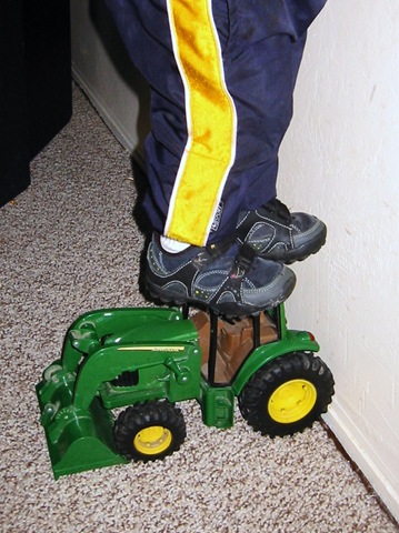 [kaylor standing on tractor[4].jpg]