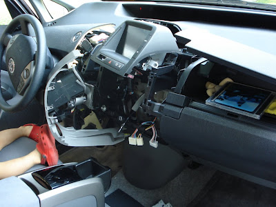 I had to disassemble the dashboard of our new Prius to remove change from the CD player, put there by my little “helper” Eidan