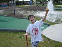 Kai on the mini-golf course at Franklin Square Park