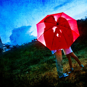 Love under in Red Umbrella by Roland Caranzo - People Couples ( roland caranzo, caranzodigital, wedding photographers, portrait photographers, cebu photographers )