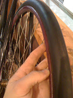 solid rubber on a wooden rim