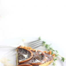 Orange Curd Tart with Dark Chocolate Ganache and Thyme Infused Cream