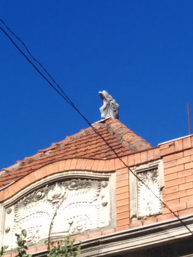 Old Building With Sculpture On Top